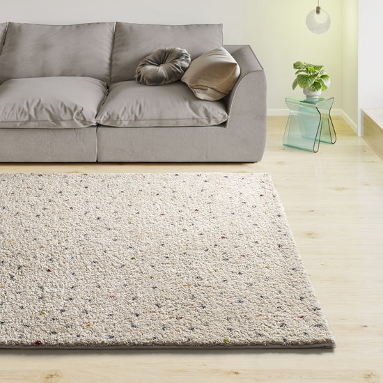 Tappeto pelo lungo bianco a pois colorati - UN2060